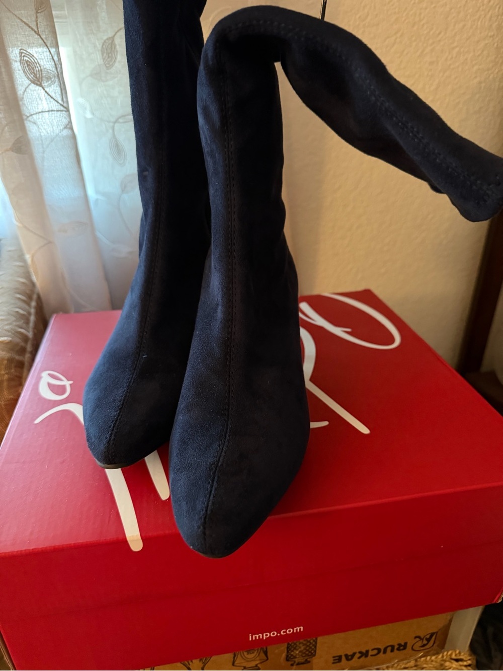 Over-the-Knee Stretch Boots in Black - Sleek Pointed Toe